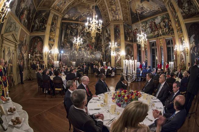 World leaders are seated for a dinner hosted by Dutch King Willem Alexander and Queen Maxima at the Orange Hall in royal palace Huis ten Bosch in The Hague Monday March 24, 2014, at the occasion of the two-day Nuclear Security Summit.