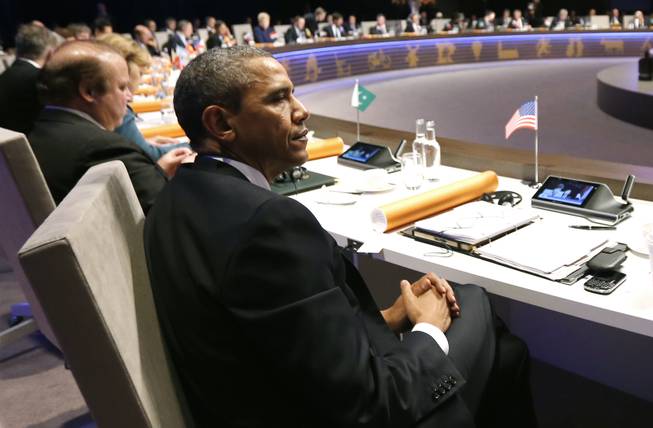U.S. President Barack Obama attends the opening session of the Nuclear Summit in The Hague, the Netherlands, on Monday, March 24, 2014. 