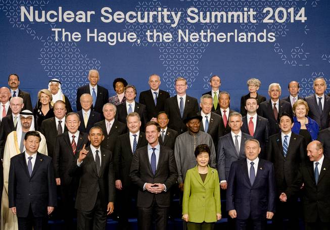 World leaders with U.S. President Barack Obama gesturing, front row second left, pose for a family photo on the last day of the Nuclear Security Summit (NSS) in The Hague, Netherlands, Tuesday, March 25, 2014. 