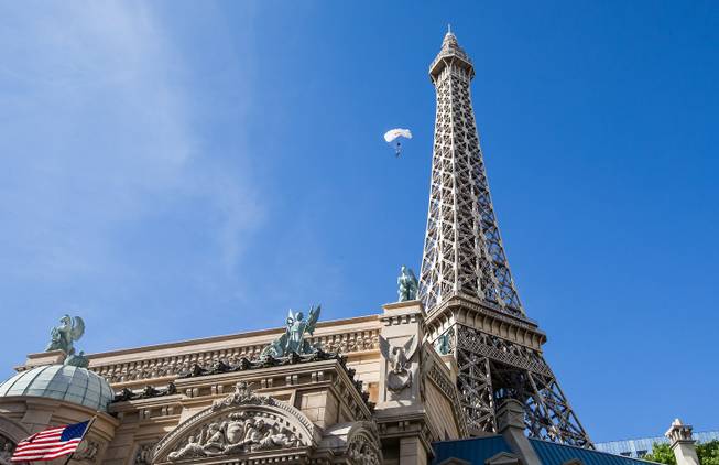 Red Bull base jumpers leap from the 541-foot Eiffel Tower ...