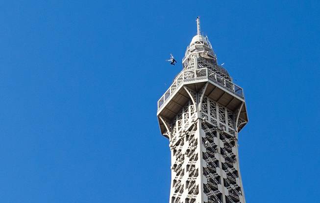 Red Bull base jumpers leap from the 541-foot Eiffel Tower ...