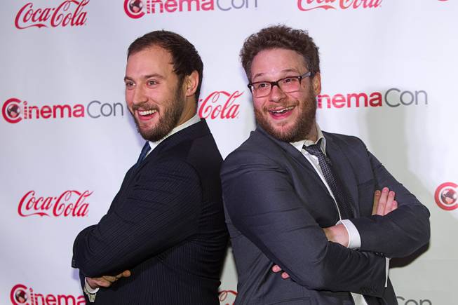 Evan Goldberg (L) and Seth Rogen, recipients of the Comedy Filmmakers of the Year award, arrive for the Big Screen Achievement Awards during CinemaCon, the official convention of the National Association of Theatre Owners, at Caesars Palace Thursday, March 27, 2014.