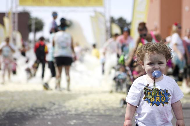 A.J. Staley stands in front of the yellow foam bog station during the 5k Bubble Run in downtown Las Vegas Saturday, March 29, 2014.