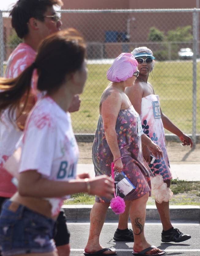 Participants dressed up as bathers for the 5k Bubble Run in downtown Las Vegas Saturday, March 29, 2014.