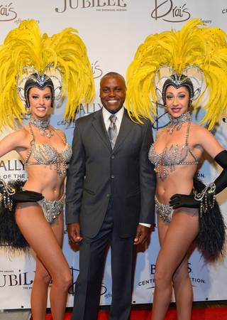 Carl Lewis attends the grand reopening of 