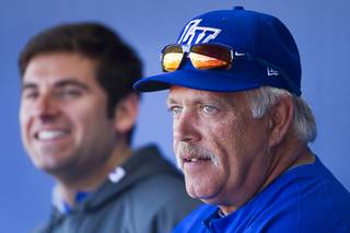 Wally Backman, right, manager of the Las Vegas 51s, watches players with athletic trainer Joseph Golia during practice at Cashman Field on Tuesday, April 1, 2014.