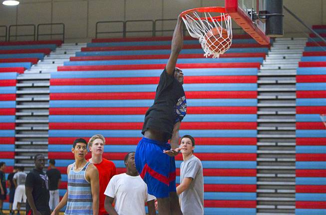 Nate Grimes dunks during Las Vegas Knicks practice at Western High School Wednesday, April 2, 2014. The club team has gone from starting its program to being nationally ranked in three years. Now they have a sponsorship from Reebok.