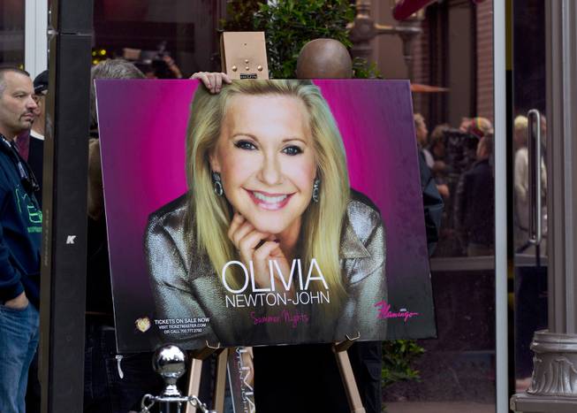 Olivia Newton-John signage marking her official Las Vegas arrival with a welcome event along the Linq at the Flamingo on Wednesday, April 2, 2014.