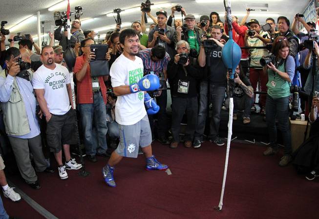 Manny Pacquiao works out during media day at the Wild Card Boxing Club in Hollywood, Calif. Wednesday, April 2, 2014 for his eagerly-anticipated rematch against undefeated WBO World Welterweight  champion Timothy Bradley.  .