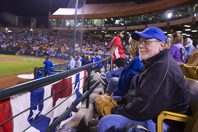 John Heise is ready for a foul ball during the 51's season opener against the Fresno Grizzlies Thursday, April 3, 2014.