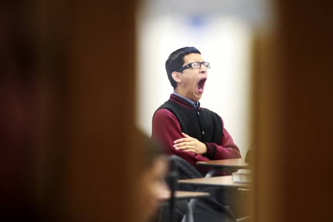 Jose Castaneda yawns during his first period class at Mojave Hight School Thursday, April 3, 2014.