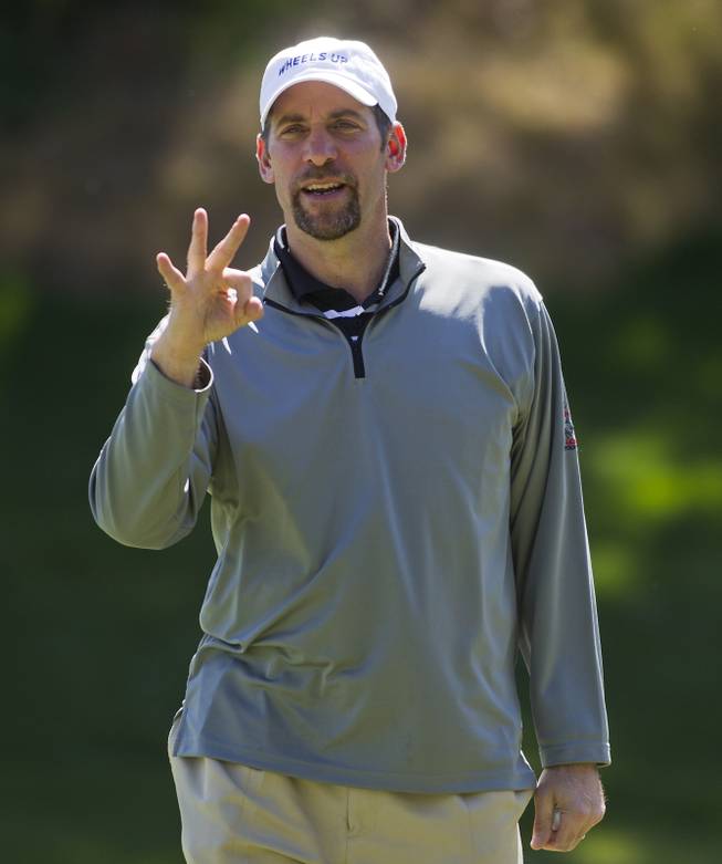 Former MLB player John Smoltz shows his score on hole 9 during opening day play of the Michael Jordan Celebrity Invitational at Shadow Creek Golf Course on Thursday, April 3, 2014.