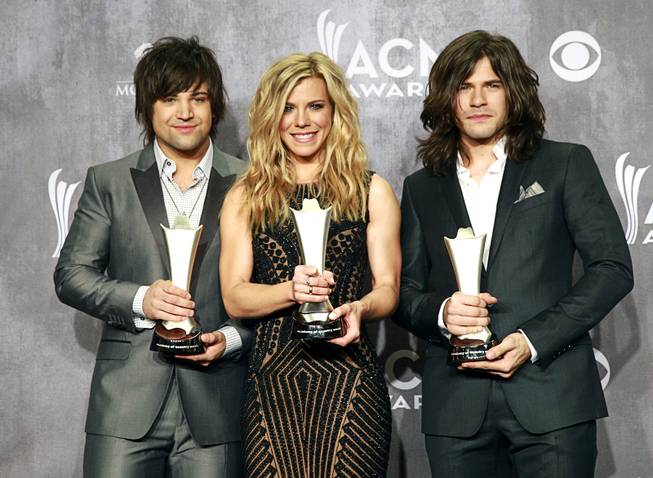 The Band Perry in the photo room at the 49th Academy of Country Music Awards at MGM Grand Garden Arena on Sunday, April 6, 2014, in Las Vegas. The group won the award for Vocal Group of the Year.