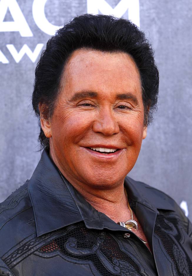 Wayne Newton arrives for the 49th Academy of Country Music Awards show at the MGM Grand Garden Arena Sunday, April 6, 2014.