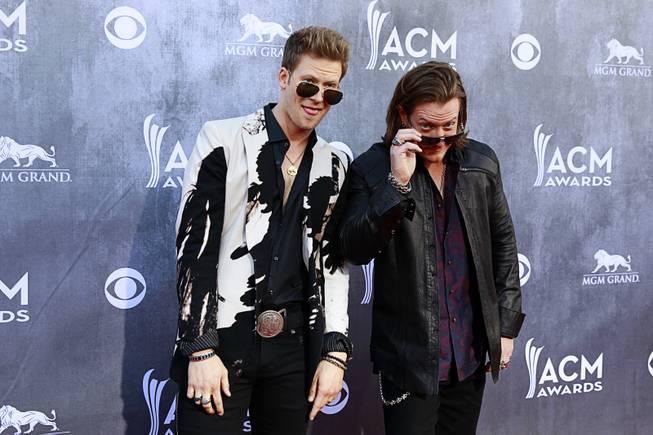 Brian Kelley, left, and Tyler Hubbard of Florida Georgia Line arrive for the 49th Academy of Country Music Awards show at the MGM Grand Garden Arena Sunday, April 6, 2014.