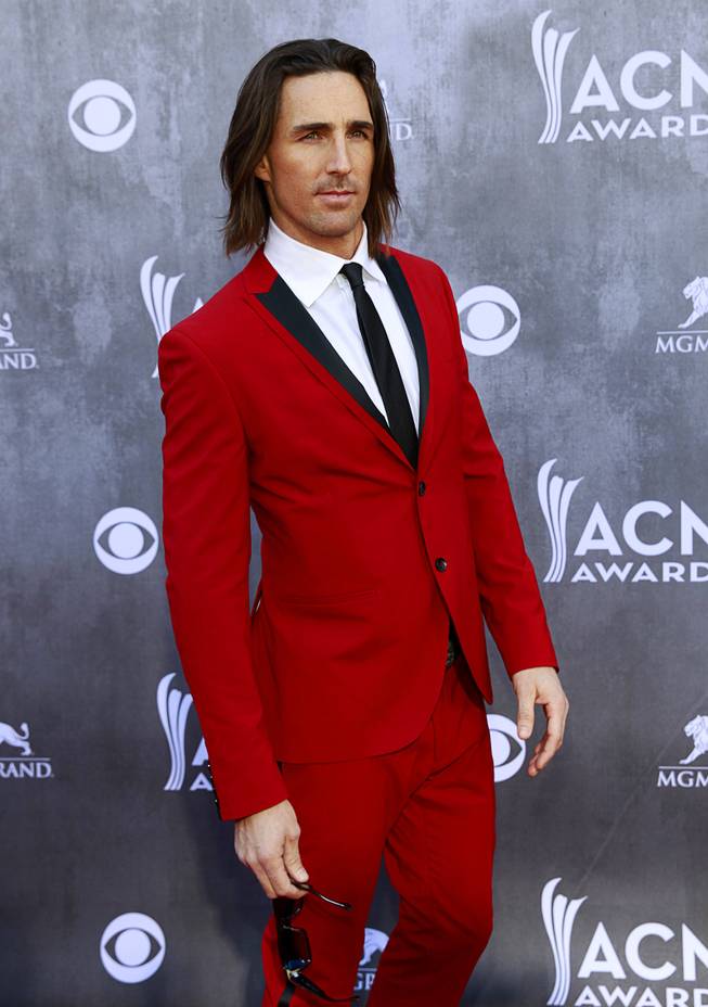Jake Owen arrives for the 49th Academy of Country Music Awards show at the MGM Grand Garden Arena Sunday, April 6, 2014.