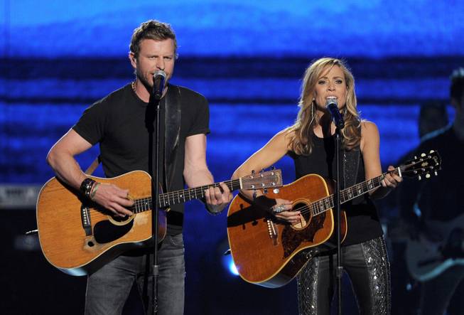 Dierks Bentley and Sheryl Crow perform onstage at the 49th annual Academy of Country Music Awards at MGM Grand Garden Arena on Sunday, April 6, 2014, in Las Vegas.