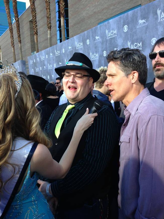John Popper arrives on the red carpet at the 49th Annual Academy of Country Music Awards on Sunday, April 6, 2014, at MGM Grand Garden Arena.