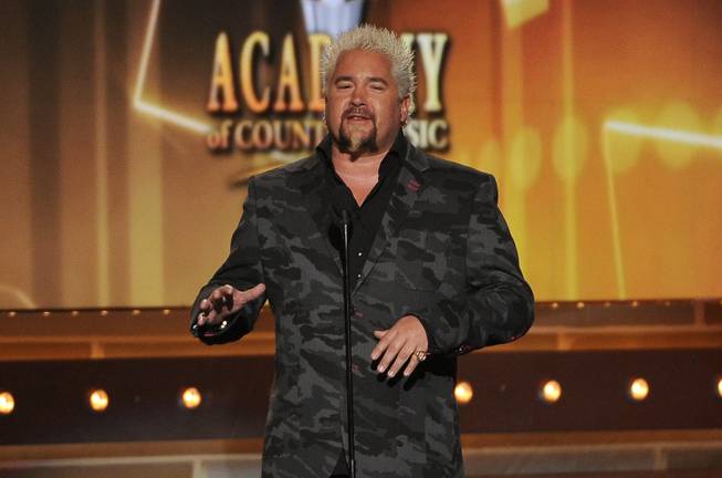 Guy Fieri speaks onstage at the 49th Annual Academy of Country Music Awards at MGM Grand Garden Arena on Sunday, April 6, 2014, in Las Vegas.