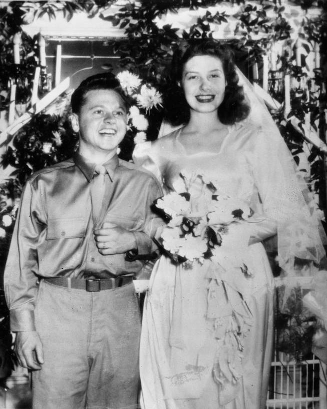 Pvt. Mickey Rooney, who is currently stationed for wartime service at Camp Sibert, Ala., and his bride Betty Jane Rase, 17, smile happily after their wedding ceremony, in Birmingham, Ala., on September 30, 1944.