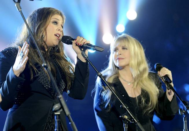 Hillary Scott, of the musical group Lady Antebellum, left, and Stevie Nicks perform on stage at the 49th annual Academy of Country Music Awards at the MGM Grand Garden Arena on Sunday, April 6, 2014, in Las Vegas. 
