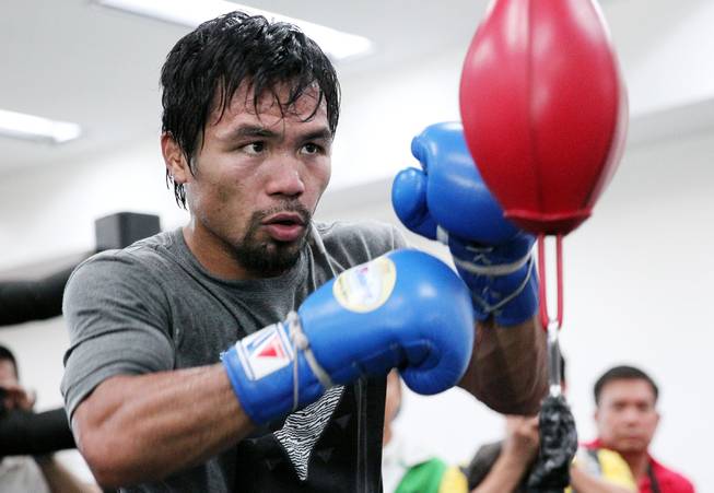 Manny Pacquiao works out at the Wild Card Boxing Club in Hollywood,Ca. during the final day of training camp Monday, April 7, 2014,  before heading to Las Vegas for his rematch against undefeated WBO World Welterweight champion Timothy Bradley.