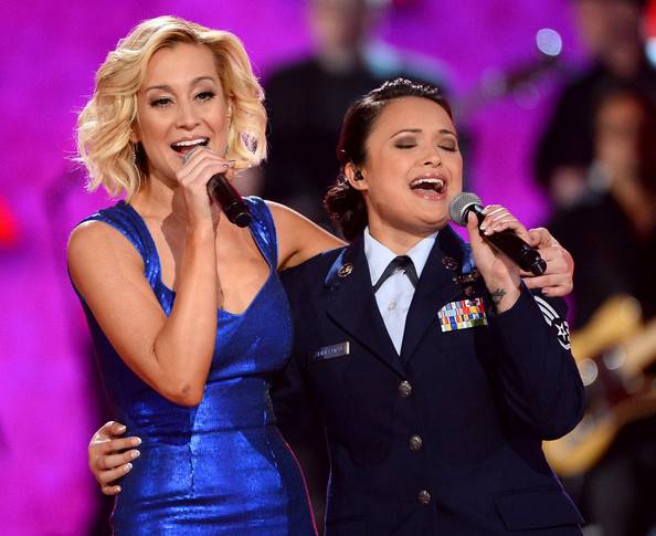 Kellie Pickler and Staff Sgt. Baily Zimmerman perform during “ACM ...
