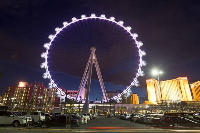 The 550 foot-tall High Roller observation wheel, the tallest in the world, in shown Wednesday, April 9, 2014. The wheel is the centerpiece of the $550 million Linq project, a retail, dining and entertainment district by Caesars Entertainment Corp.