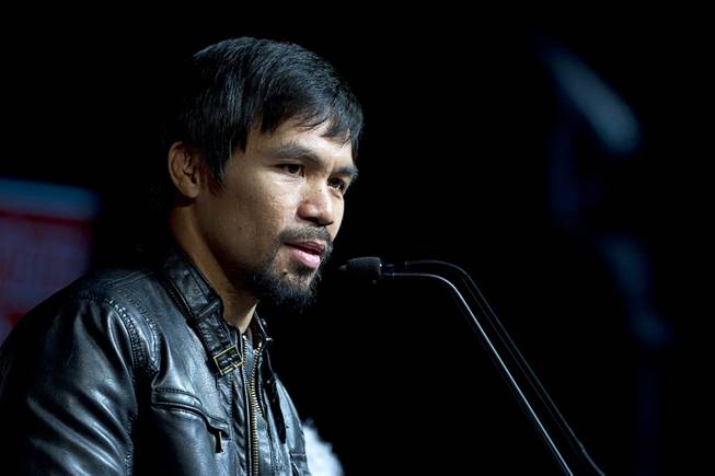 Boxer Manny Pacquiao of the Philippines speaks during a news conference at the MGM Grand Wednesday, April 9, 2014. Pacquiao will challenge undefeated WBO welterweight champion Timothy Bradley at the MGM Grand Garden Arena on Saturday. The fight is a rematch to a June 9, 2012 fight that Bradley won.