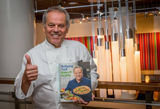 Wolfgang Puck signs copies of his newly released cookbook 