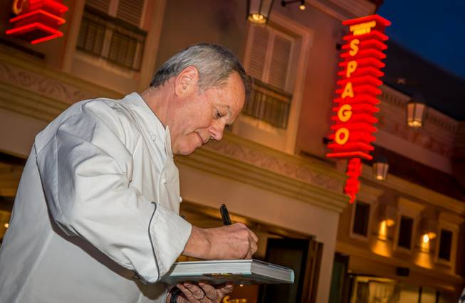 Wolfgang Puck signs copies of his newly released cookbook 