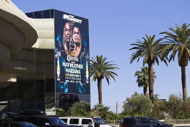 An advertisement for Floyd Mayweather Jr.'s upcoming fight is seen at the MGM Grand Thursday, April 10, 2014. Top Rank CEO Bob Arum, promoter for boxer Manny Pacquiao, voiced his displeasure at the Mayweather signage during a news conference on Wednesday.
