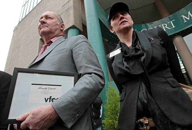 Actor Randy Quaid and his wife, Evi Quaid, attend a news conference Wednesday, Feb. 23, 2011, in Vancouver, B.C.