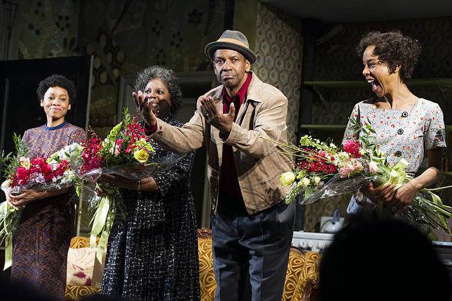 Anika Noni Rose, from left, LaTanya Richardson, Denzel Washington and Sophie Okonedo are shown at the curtain call for the opening night of “A Raisin in the Sun” in New York, April 3, 2014.
