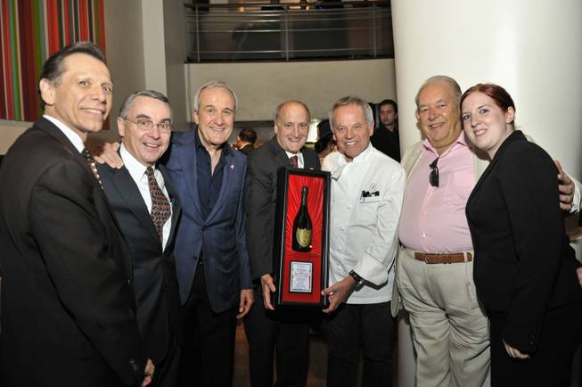 Wolfgang Puck, third from right, receives the UNLVino Dom Perignon ...