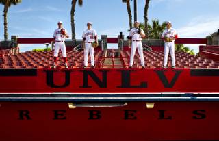 UNLV baseball pitchers Erick Fedde, 20, Kenny Oakley, 25, Bryan Bonnell,11, and John Richy, 45, at the Earl E. Wilson Stadium on Thursday, April 10, 2014.