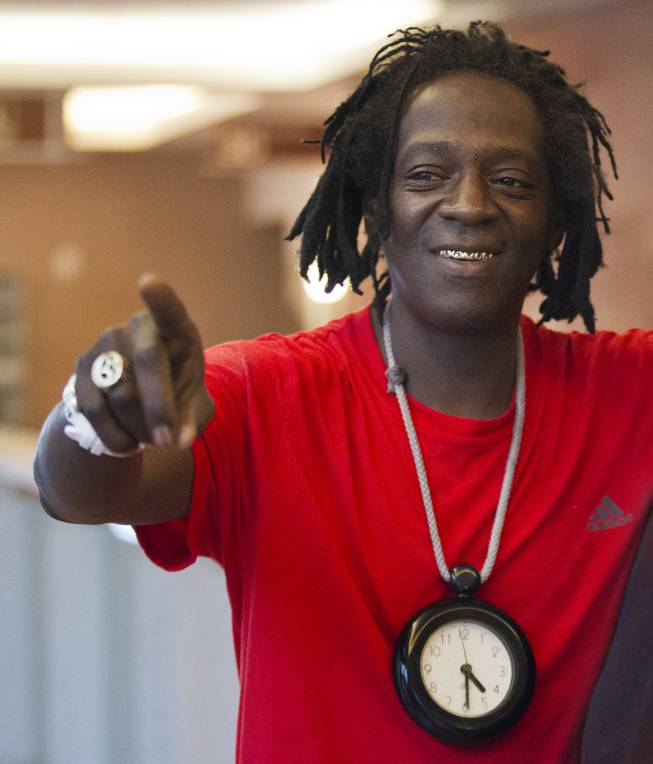 William Jonathan Drayton, Jr., aka Flavor Flav, is all smiles after receiving probation for a misdemeanor battery charge at the Regional Justice Center on Monday, April 14, 2014.