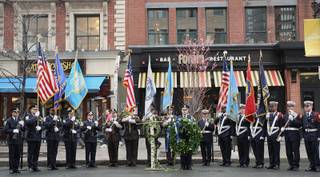 Honor Guard members line up in front of the Forum Restaurant in Copley Square, where a wreath laying ceremony was held to commemorate the one year anniversary of the Boston Marathon bombings, Tuesday, April 15, 2014. (AP Photo/The Boston Globe, Wendy Maeda)  BOSTON HERALD OUT, QUINCY OUT; NO SALES
