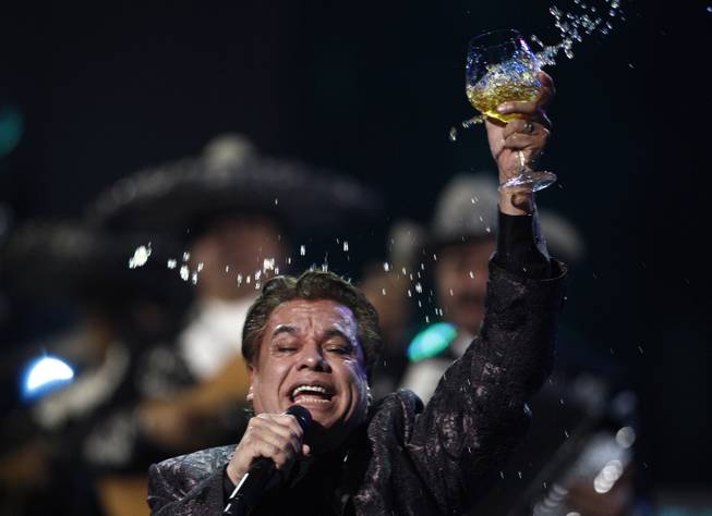 In this Thursday, Nov. 5, 2009, file photo, Juan Gabriel performs at the 10th Annual Latin Grammy Awards in Las Vegas.