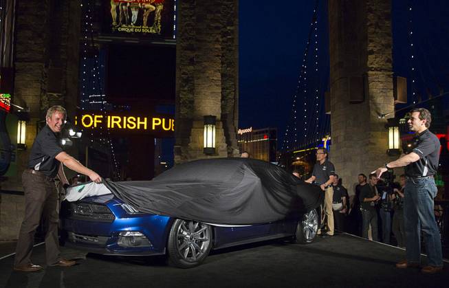 A 2015 50 Year Limited Edition Mustang is unveiled in front of the New York-New York Thursday April 17, 2014. The unveiling was part of the Mustang 50th Birthday Celebration taking place at the Las Vegas Motor Speedway. Ford announced that they will build 1,964 of the 50-Year Limited Edition model.