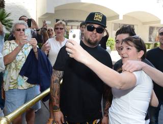 “Pawn Stars” parody “Pawn Shop Live!” officially moved to the Riviera from the Golden Nugget on Wednesday, April 16, 2014. Austin “Chumlee” Russell is pictured here posing with fans.