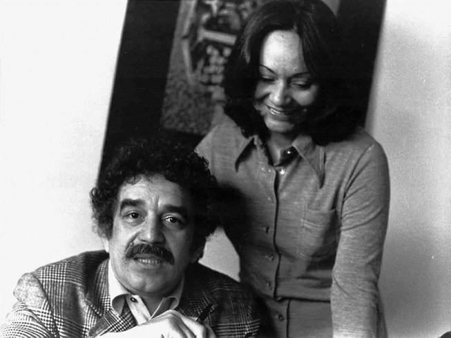 In this 1975 photo released by the Fundacion Nuevo Periodismo Iberoamericano (FNPI), Colombian author Gabriel Garcia Marquez sits with wife Mercedes Barcha at an unknown location. The Nobel laureate died on Thursday, April 17, 2014 at his home in Mexico City. His magical realist novels and short stories exposed tens of millions of readers to Latin America's passion, superstition, violence and inequality. The FNPI was founded by Garcia Marquez.