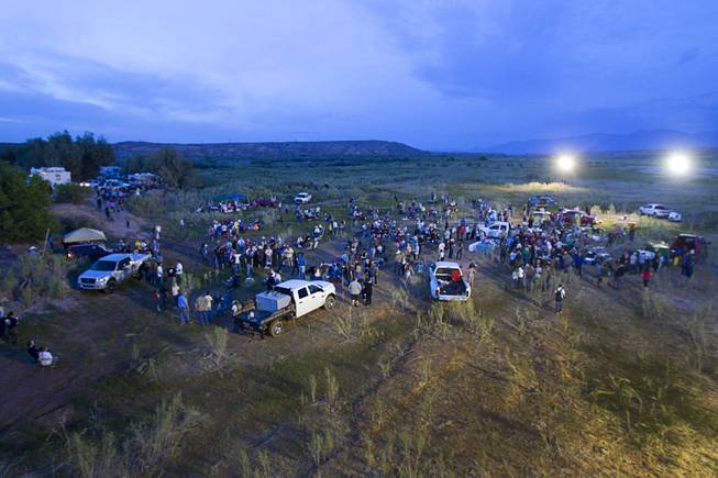 Supporters of rancher Cliven Bundy attend a "Patriot Party" near Bunkerville Friday, April 18, 2014. The Bundy family organized the party to thank people who supported Cliven Bundy in his dispute with the Bureau of Land Management.