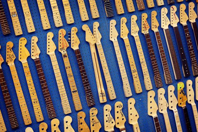 This Tuesday, Oct. 15, 2013 photo shows Fender Stratocaster electric guitar neck templates at the Fender factory in Corona, Calif. Celebrating 60 years in 2014, countless musicians continue to use the instrument to make all genres of music globally.