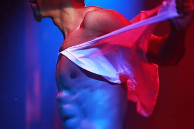 A dancer performs during a performance of “Men: The Experience” at the Riviera Thursday, April 18, 2014.