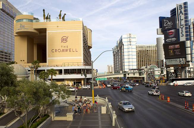 The Cromwell, left, formerly Bill's Gamblin' Hall & Saloon, is shown on the corner of Las Vegas Boulevard South and Flamingo Avenue, Monday, April 21, 2014. The casino is undergoing a $185 million renovation project that includes remodeling of guest rooms, casino floor and common areas, the addition of a new second floor restaurant, and construction of the 65,000 square foot rooftop pool and dayclub/nightclub.