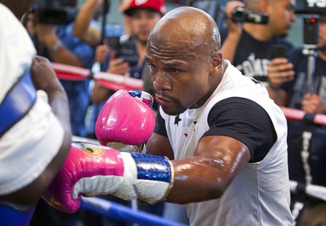 WBC welterweight champion Floyd Mayweather Jr. works out at the Mayweather Boxing Club Tuesday, April 22, 2014. Mayweather is preparing for his fight against WBA champion Marcos Maidana of Argentina at the MGM Grand Garden Arena on May 3.