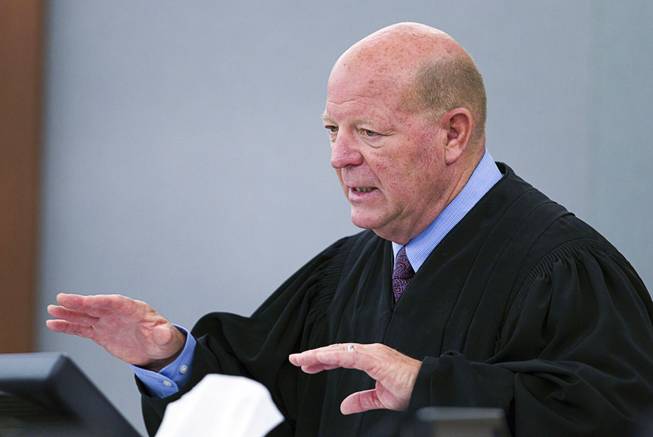 Judge James Bixler speaks during sentencing for Nyakueth Tear of Salt Lake City, Utah at the Regional Justice Center Tuesday, April 22, 2014. Tear struck eight pedestrians with her car in the street outside of a North Las Vegas church in August 2013 and fled the scene.