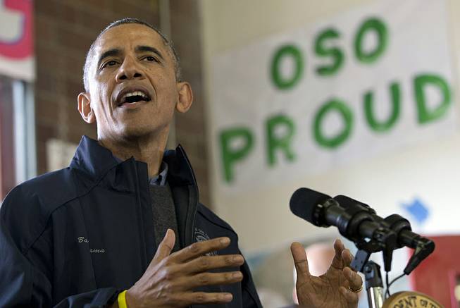 President Barack Obama speaks to first responders, recovery workers and community members at the Oso Fire Department in Oso, Wash., Tuesday, April 22, 2014, the site of the deadly mudslide that struck the community in March. 