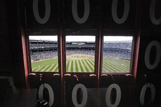 This April 10, 2014, photo shows a view of the field from inside Wrigley Field's iconic scoreboard during a baseball game between the Pittsburgh Pirates and the Chicago Cubs, in Chicago.